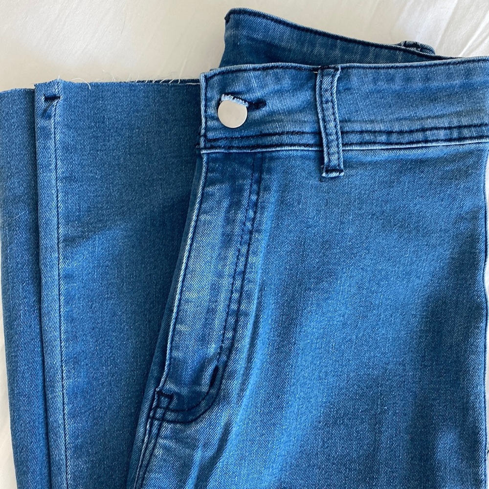 SHEIN flare jeans. Never worn. Medium wash. Size S / 4